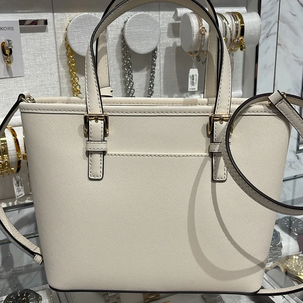 Michael Kors Jet Set Travel Extra-Small Top-Zip Tote Carryall Bag
Light Cream - Picture 7 of 16